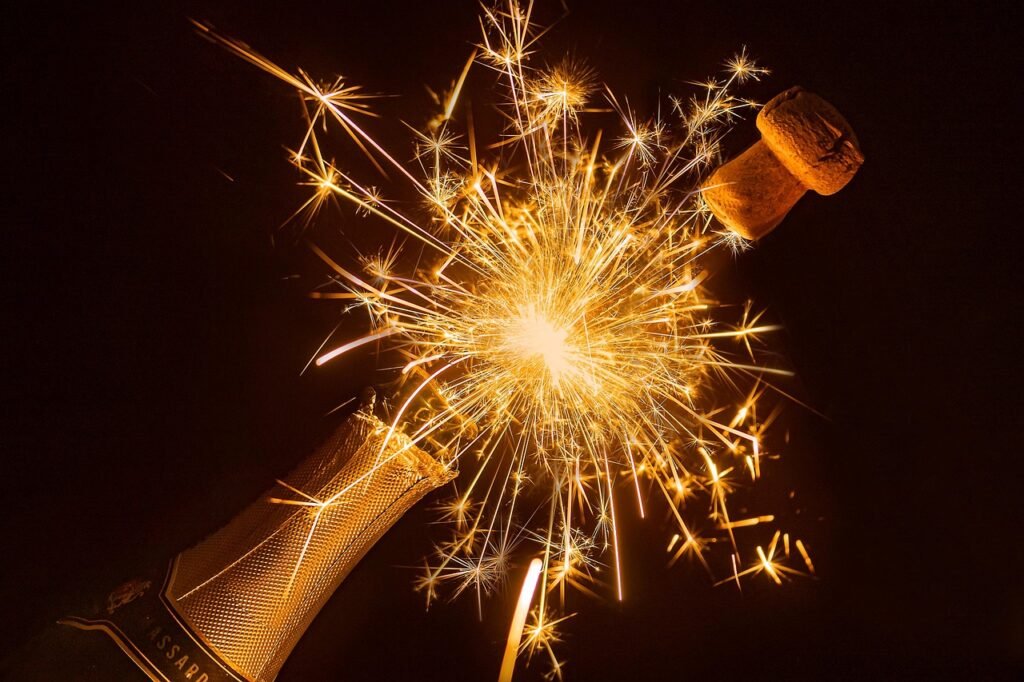 new year's eve, champagne, sparklers, happy birthday, cork, sparkling wine, bottle, champagne bottle, champagne cork, glow, glowing, sparkling, bottle of sparkling wine, celebration, sparkle, light