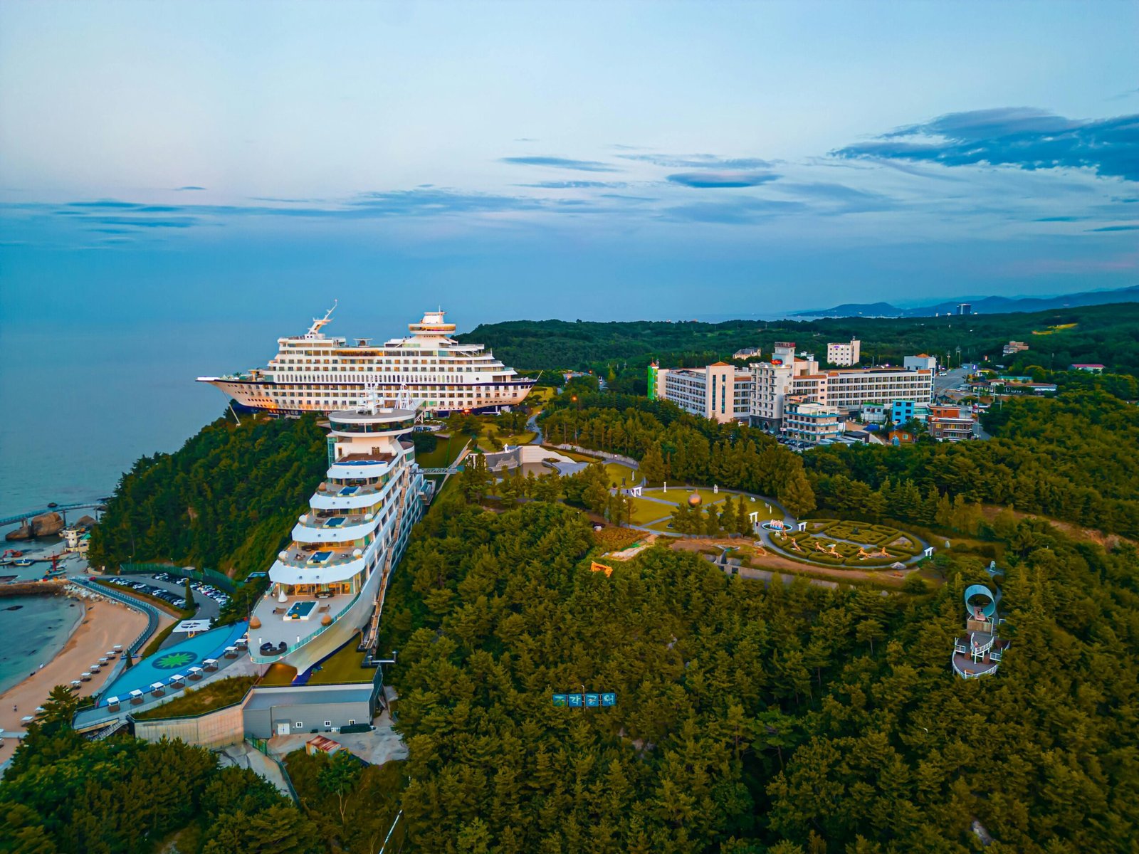 Stunning aerial view of the Sun Cruise Hotel and coastal forest in Gangwon, South Korea.
